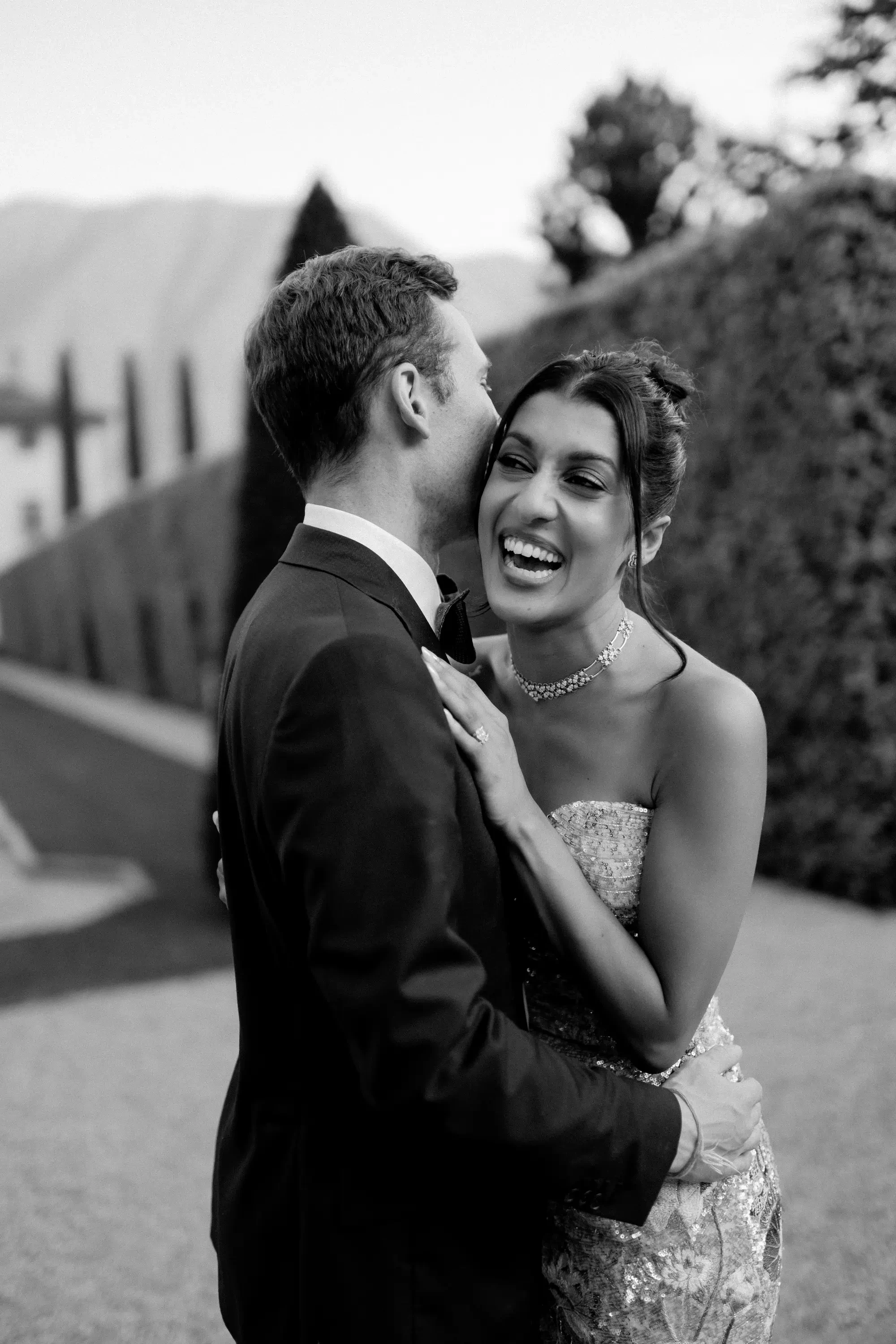 Black And White Candid Bride And Groom Laughing Portrait