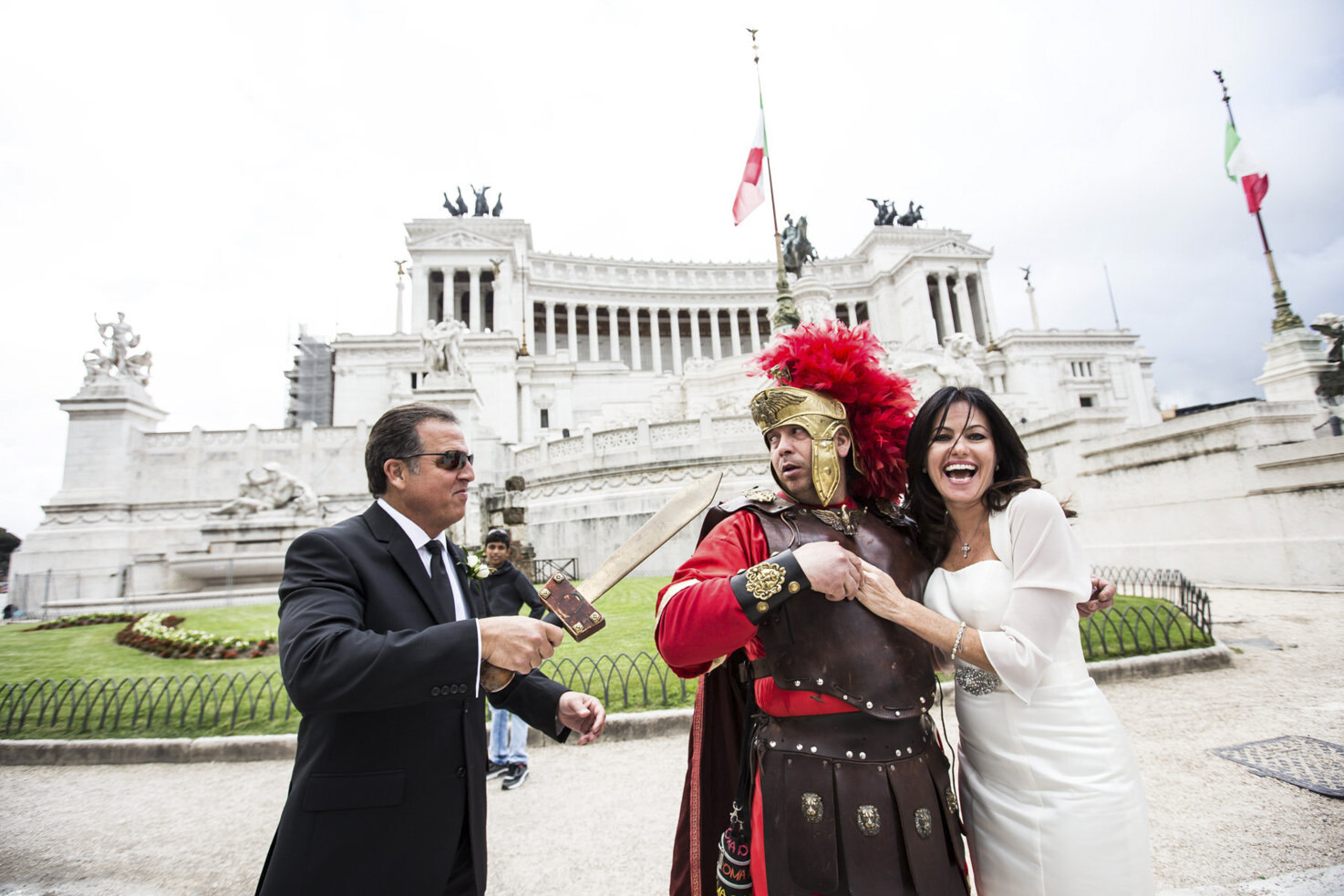 Bride and groom with a Roman centurione