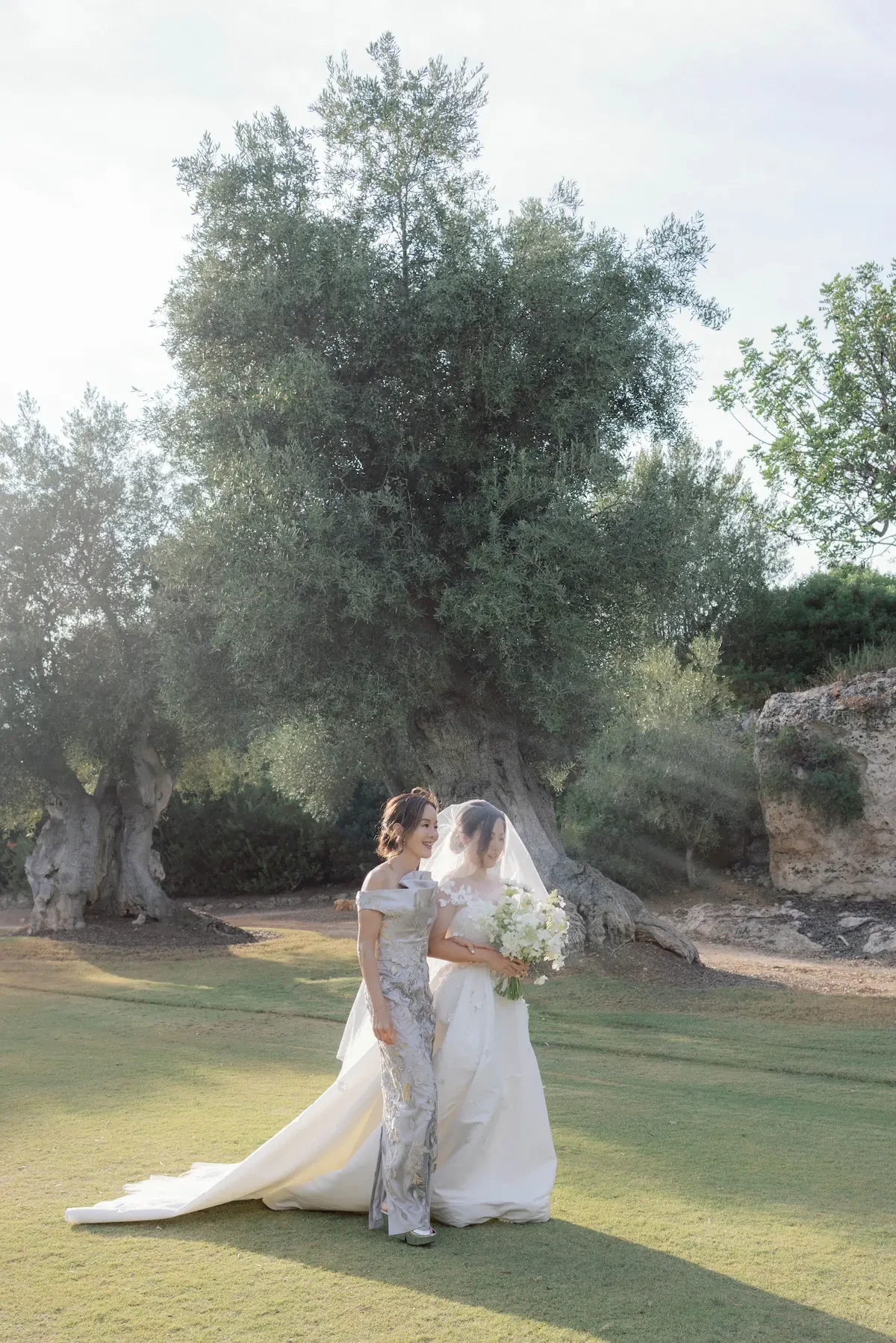Bride Walking Down The Aisle With Mother
