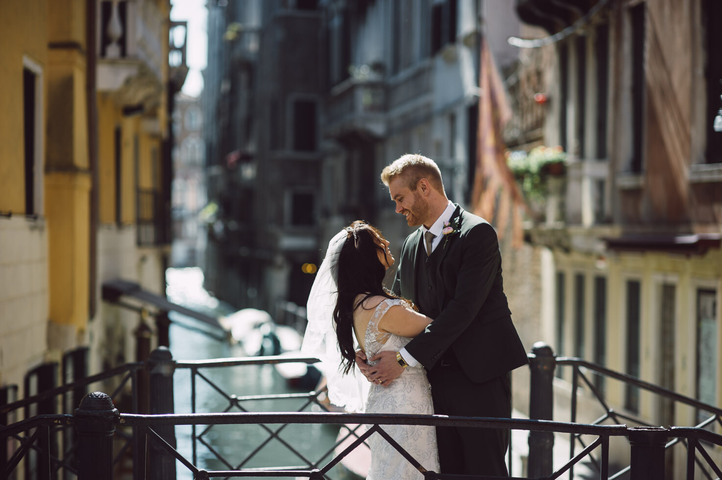Bride and groom on a bridge