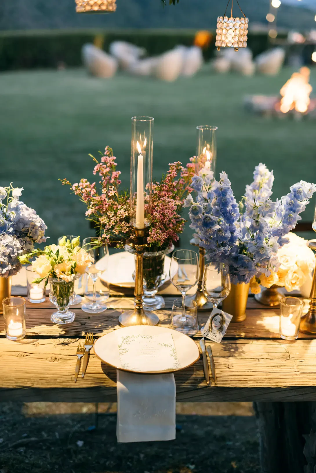 Pink white and blue flowers for wedding table