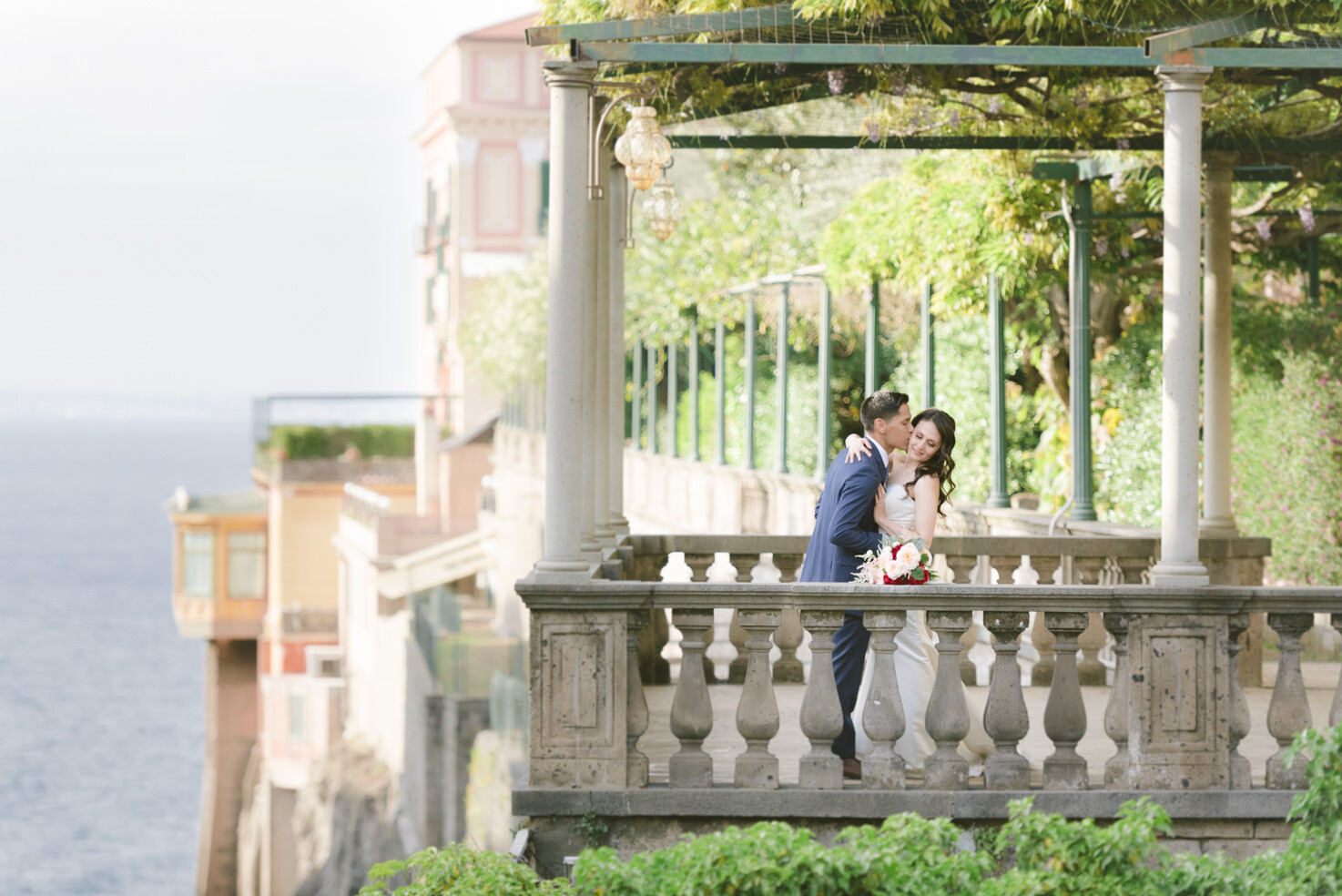Bridal couple on a terrace in Sorrento by the sea