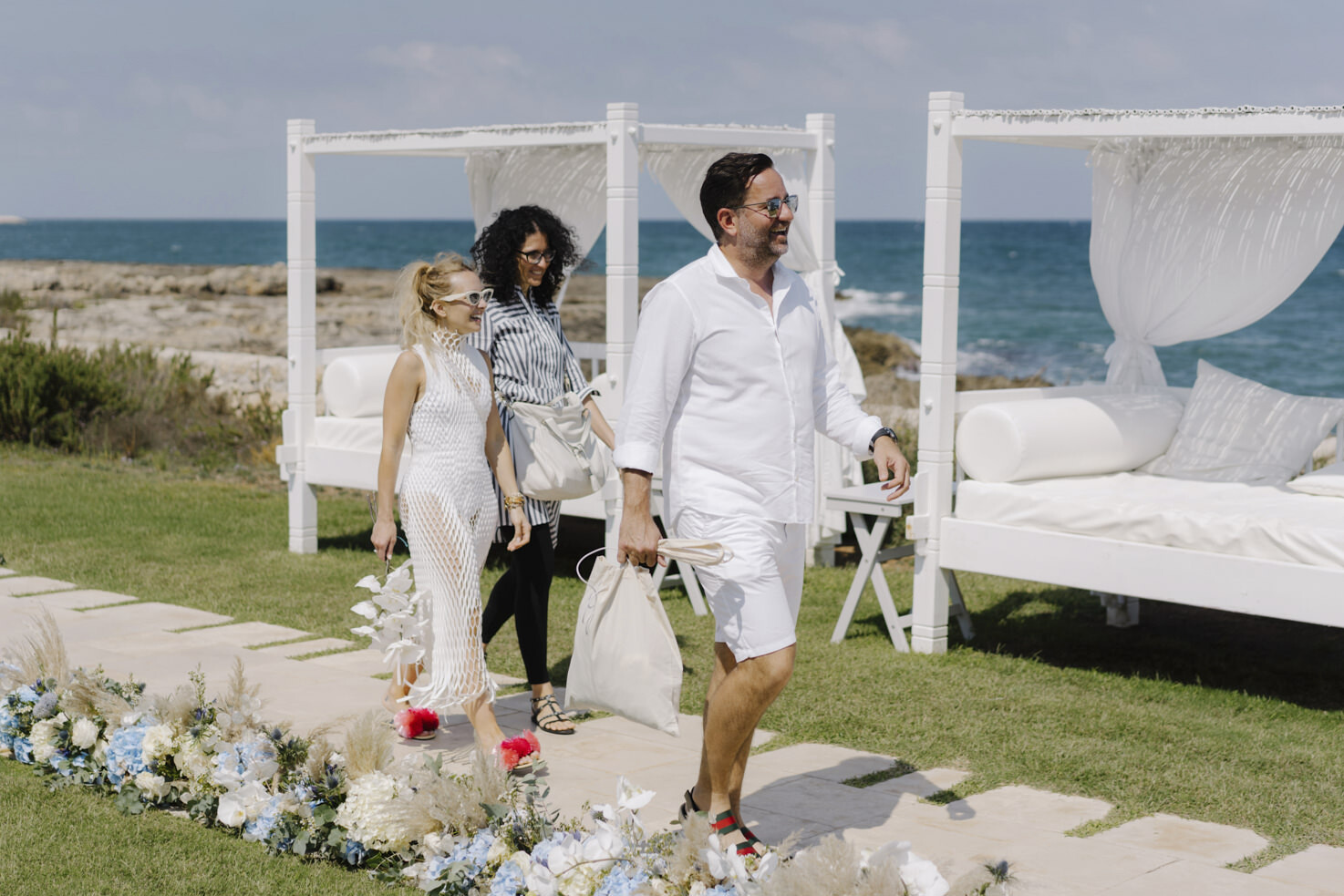 Bride and groom with their wedding planner