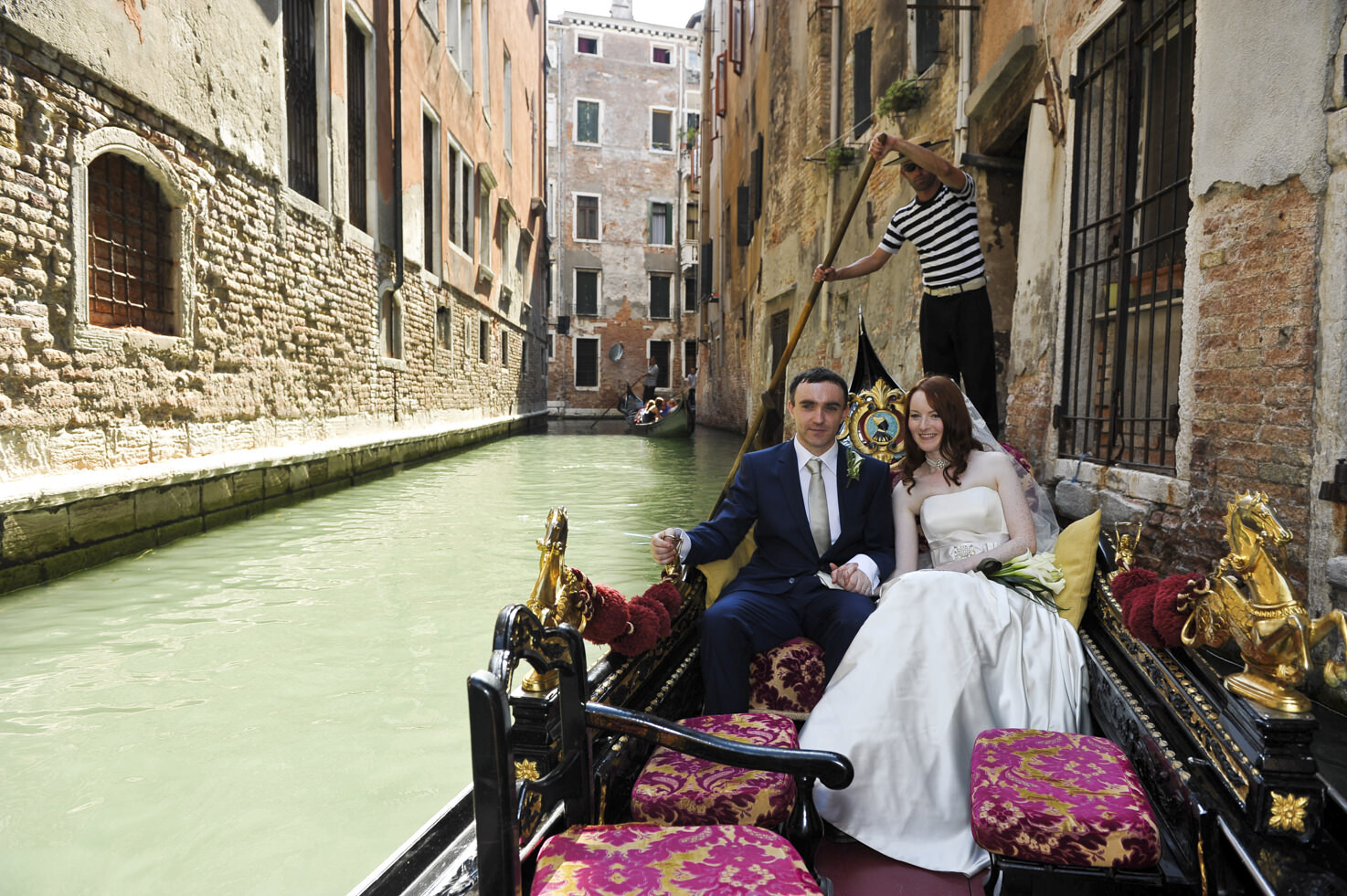 Bride and groom on a gondola