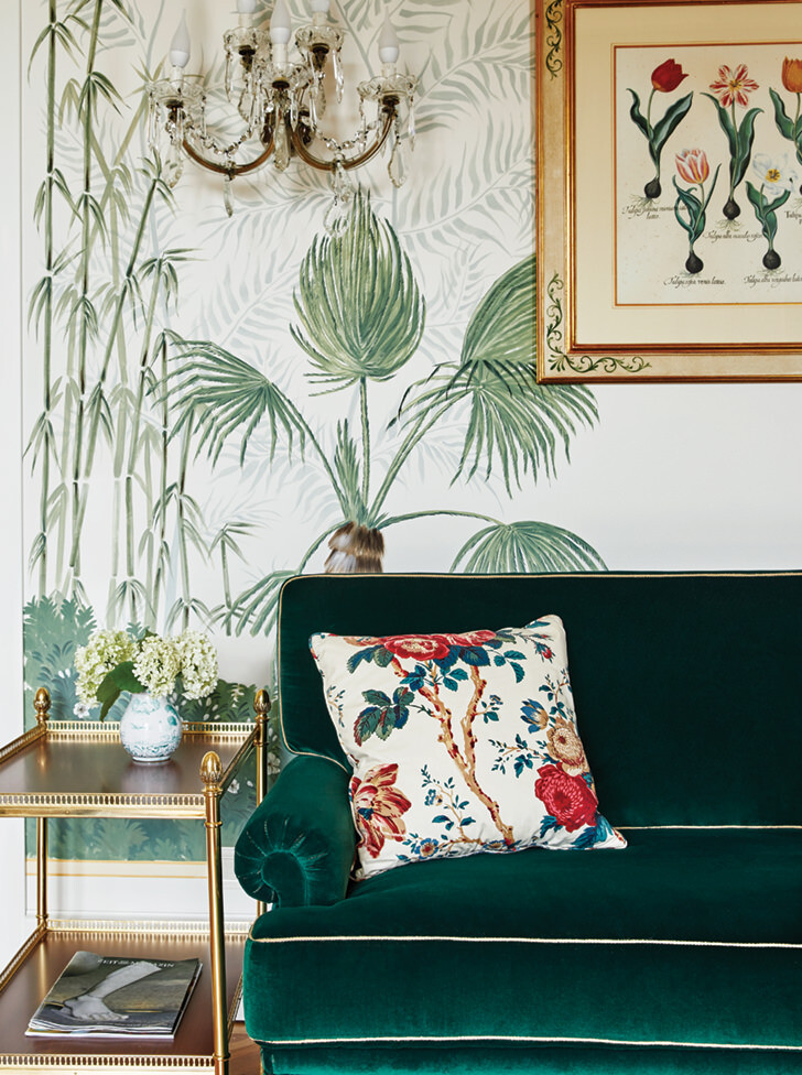 Sofa and frescoed wall in the suite