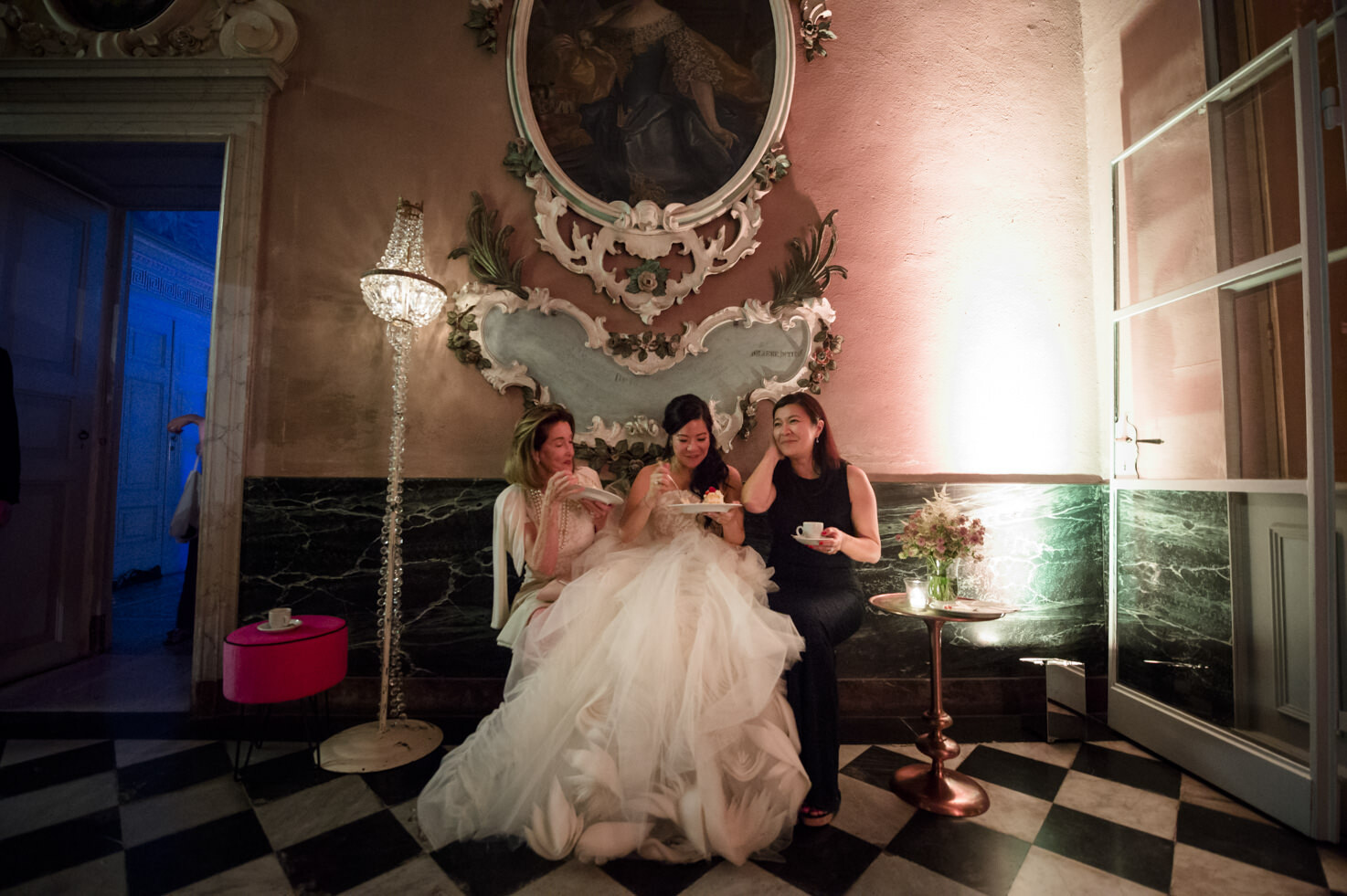 Bride and guests in a hall of Villa Pizzo