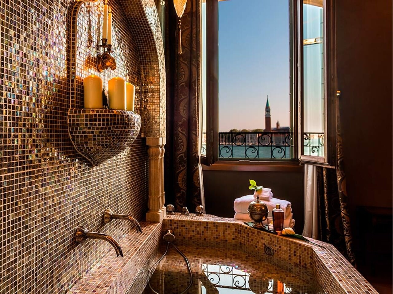 Bathroom with mosaics at Metropole Hotel