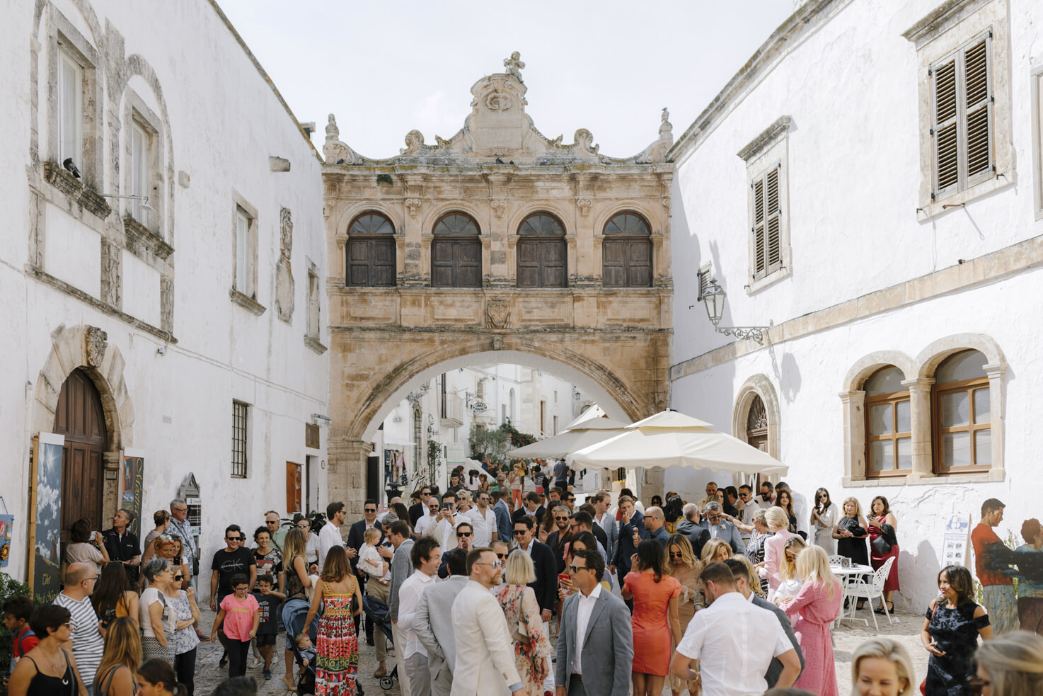 Wedding guests in a square in Ostuni