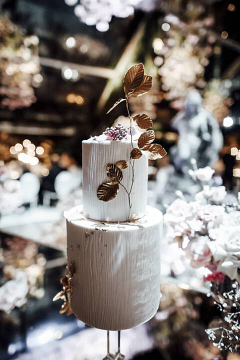 Wedding cake with gold leaves