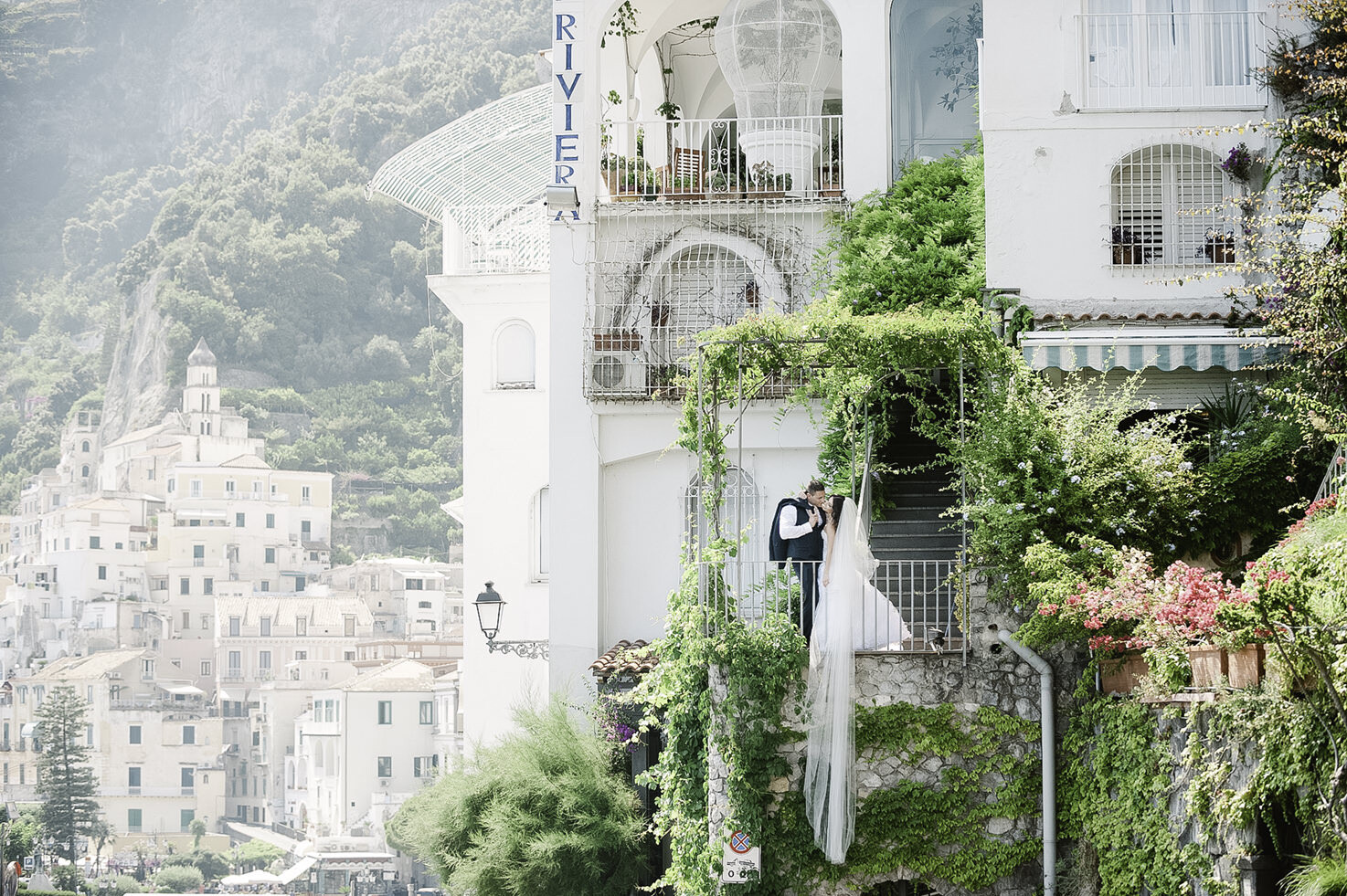 Bridal couple with panorama of Amalfi